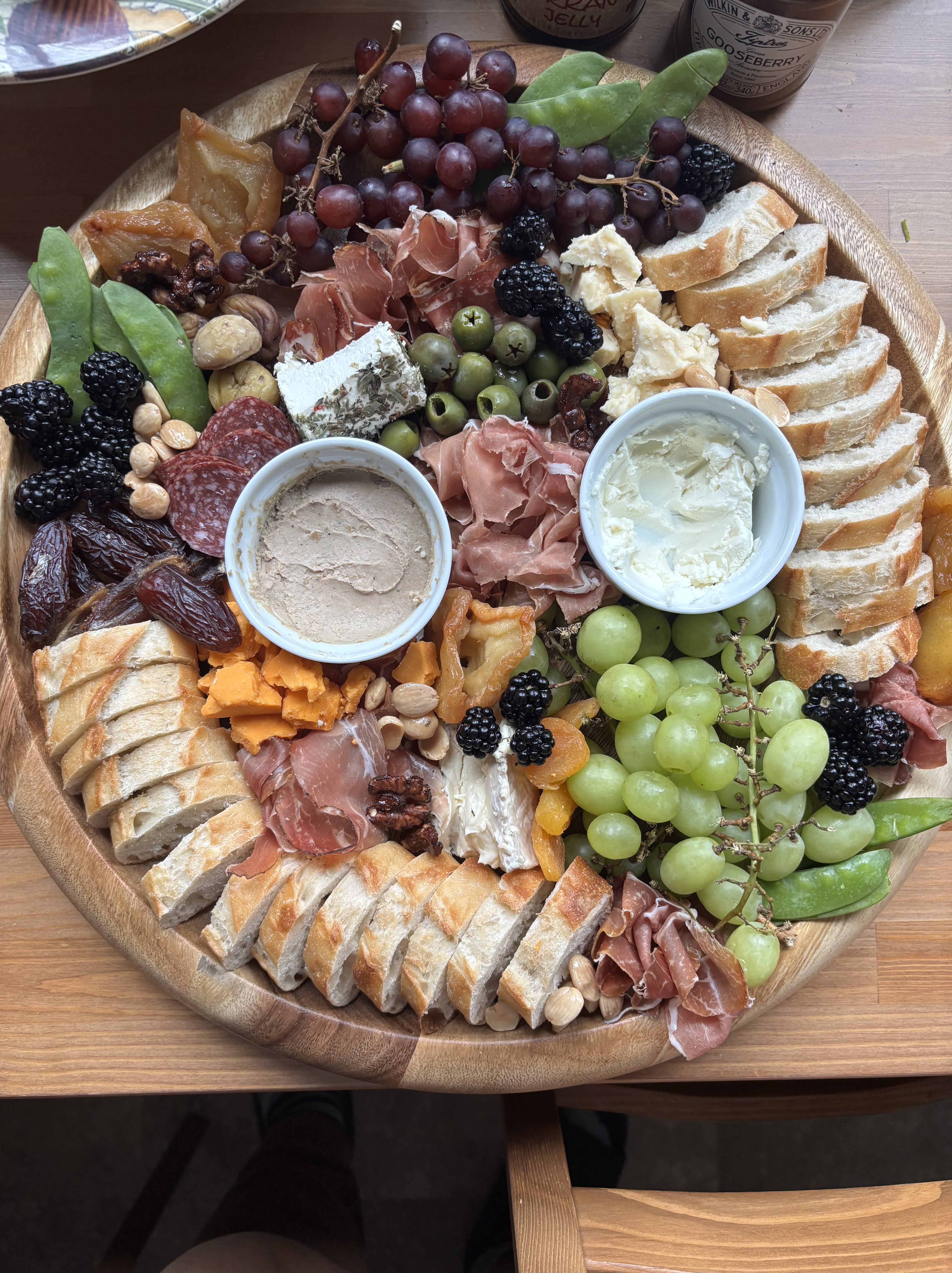 A classic charcuterie board on a circle platter.