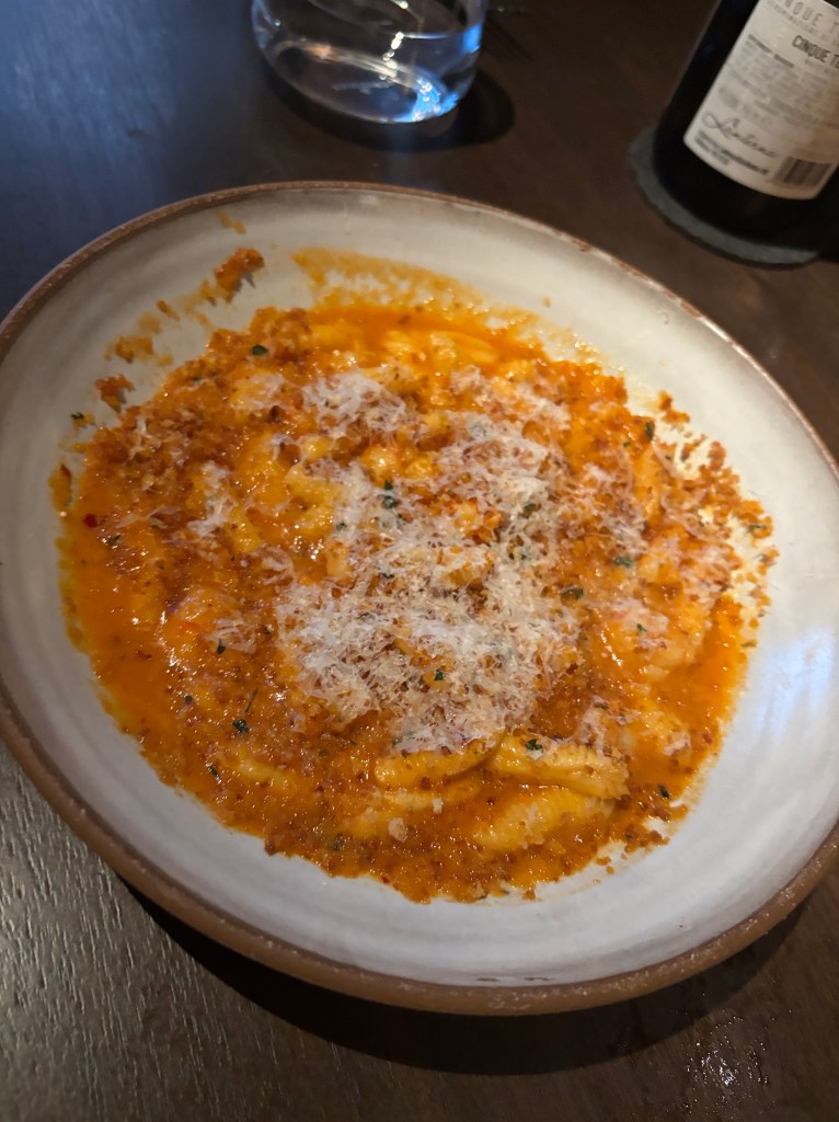 Red sauce spicy pasta with parmesan.