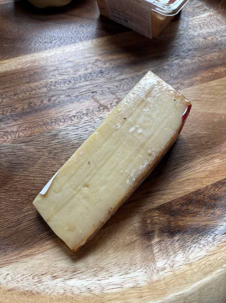 A wedge of Sartori cheese, supposedly pizza-inspired.